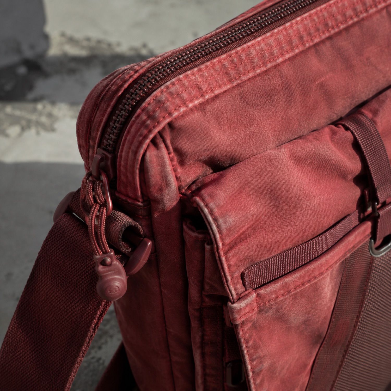 Vector compact sling bag — Crossbody Bags by SH SNEAKERS. close detail of the fabric and finish.